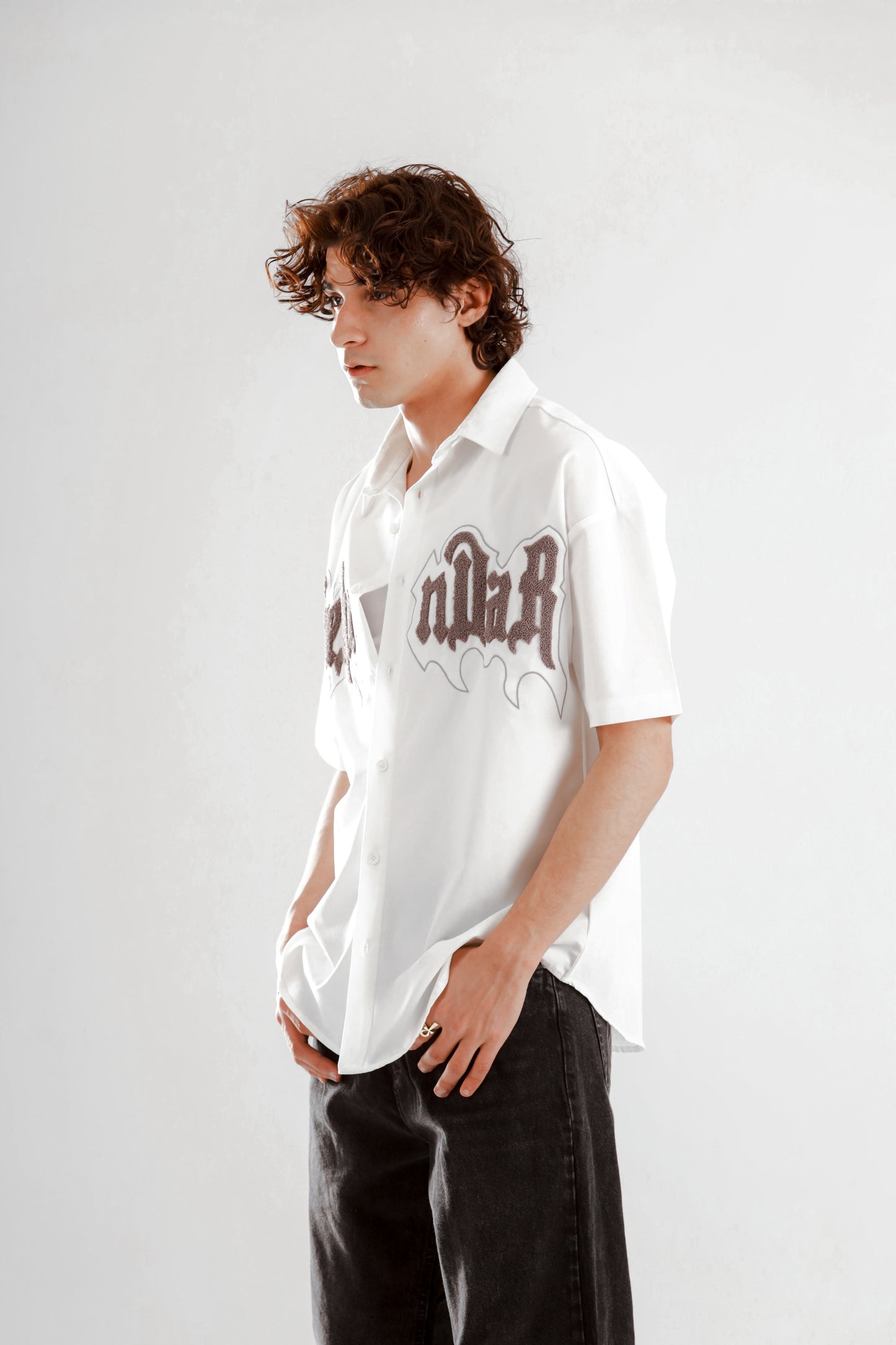 Oversized short sleeve shirt with front teddy stitching