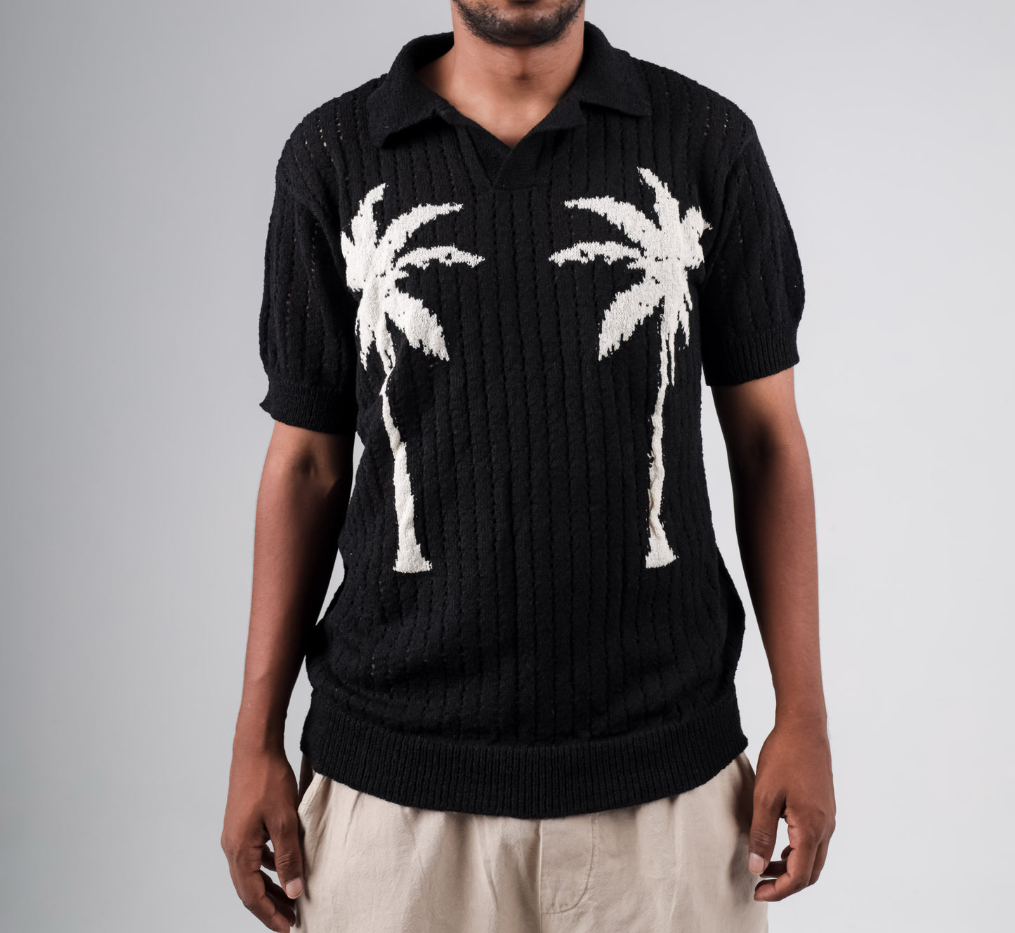 Knitted polo shirt with palm printed