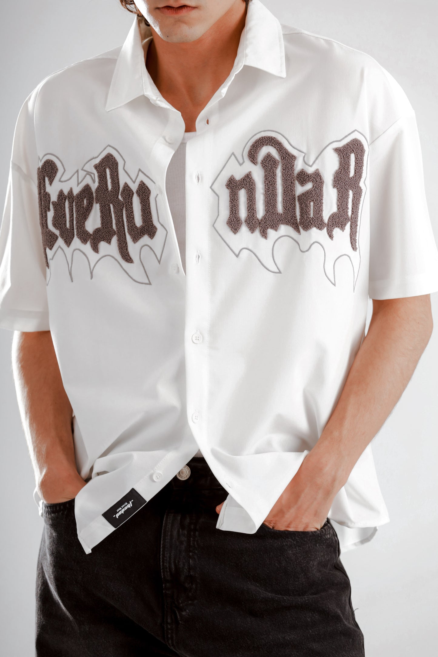 Oversized short sleeve shirt with front teddy stitching