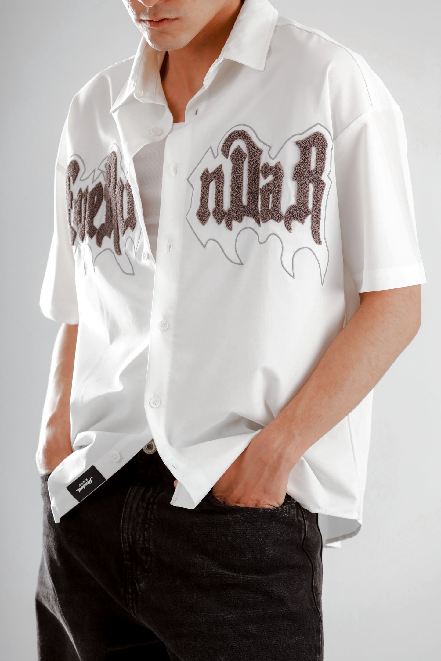 Oversized short sleeve shirt with front teddy stitching