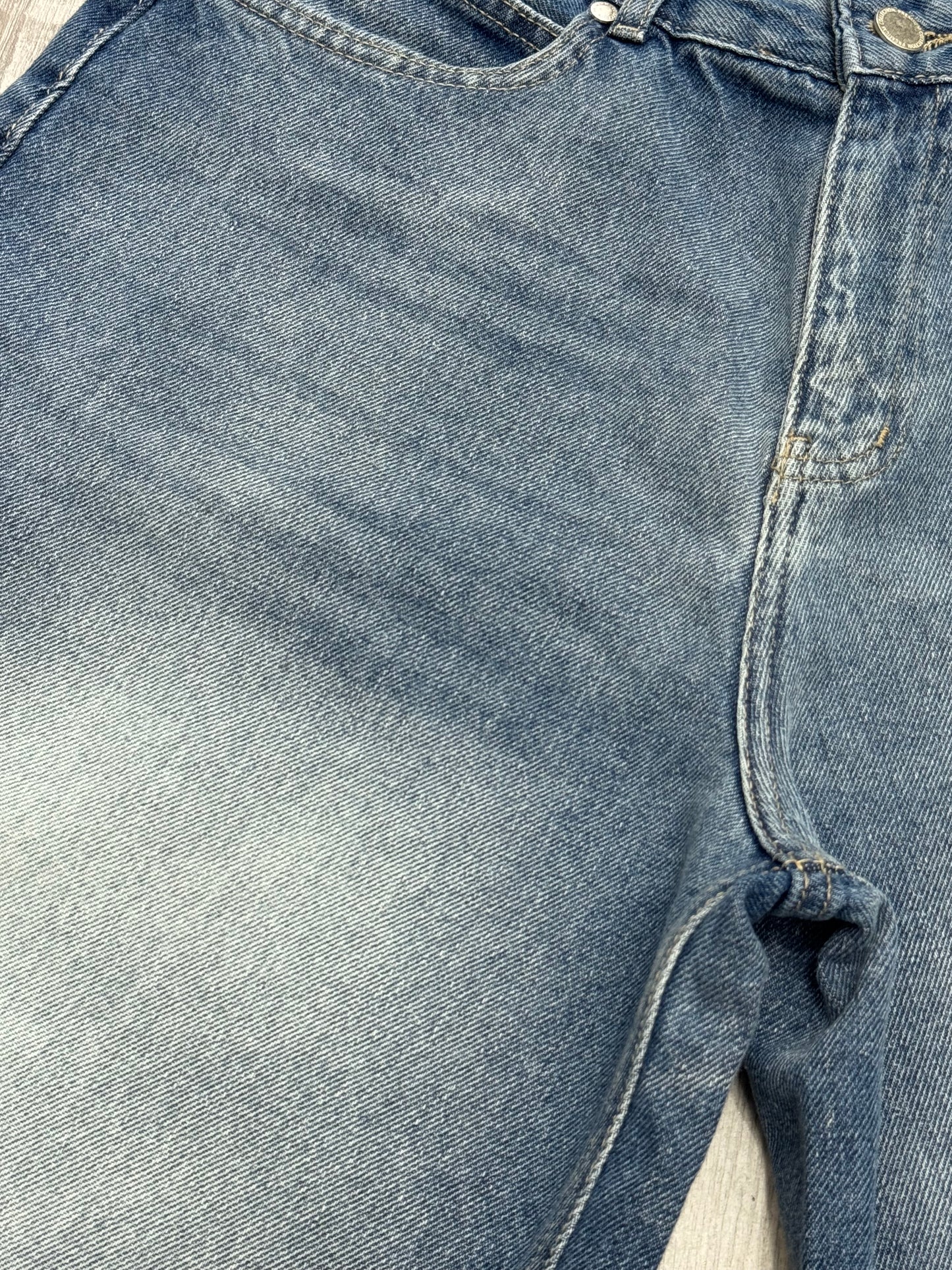 Baggy denim short in mid blue stone washed