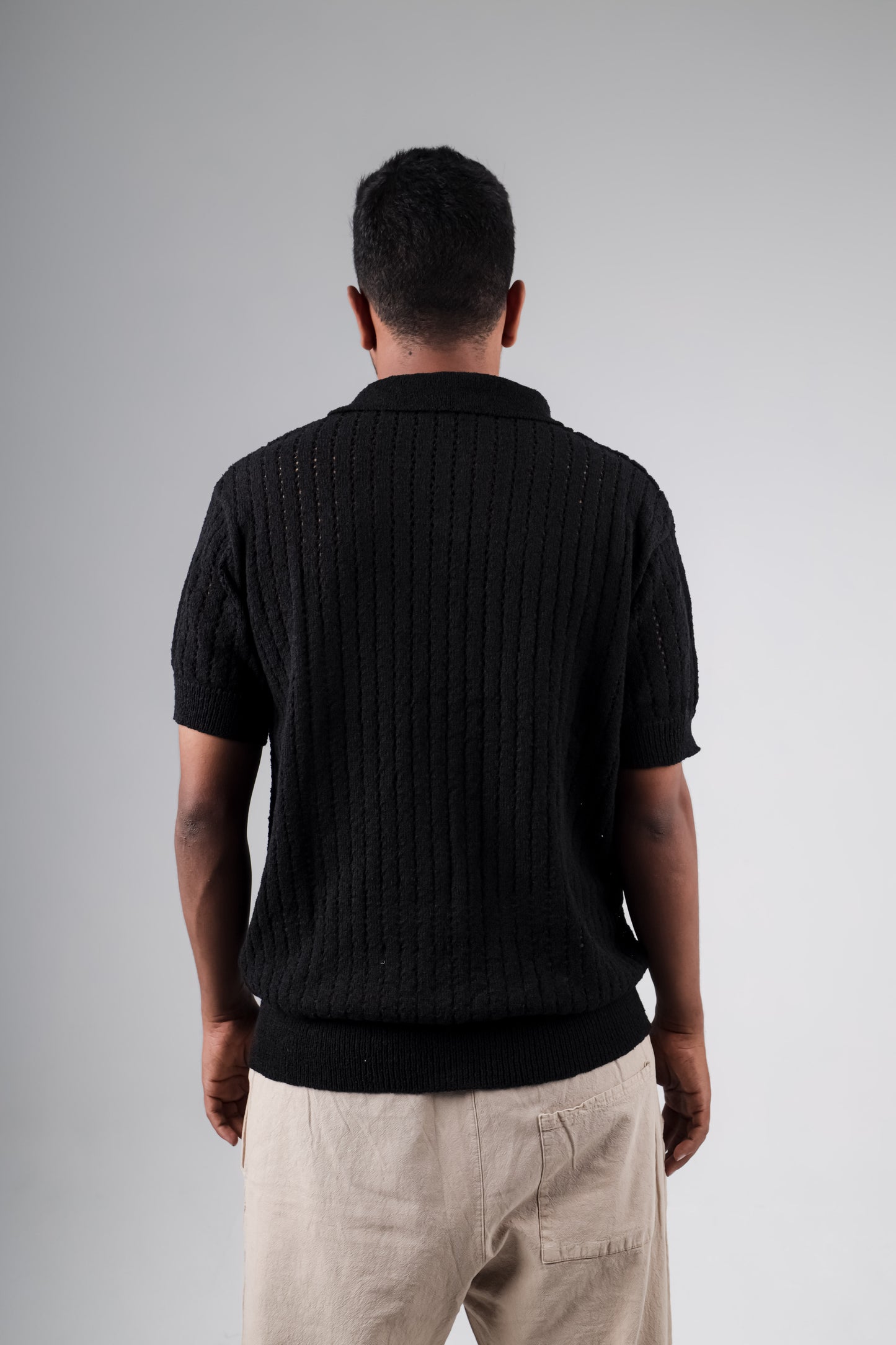 Knitted polo shirt with palm printed