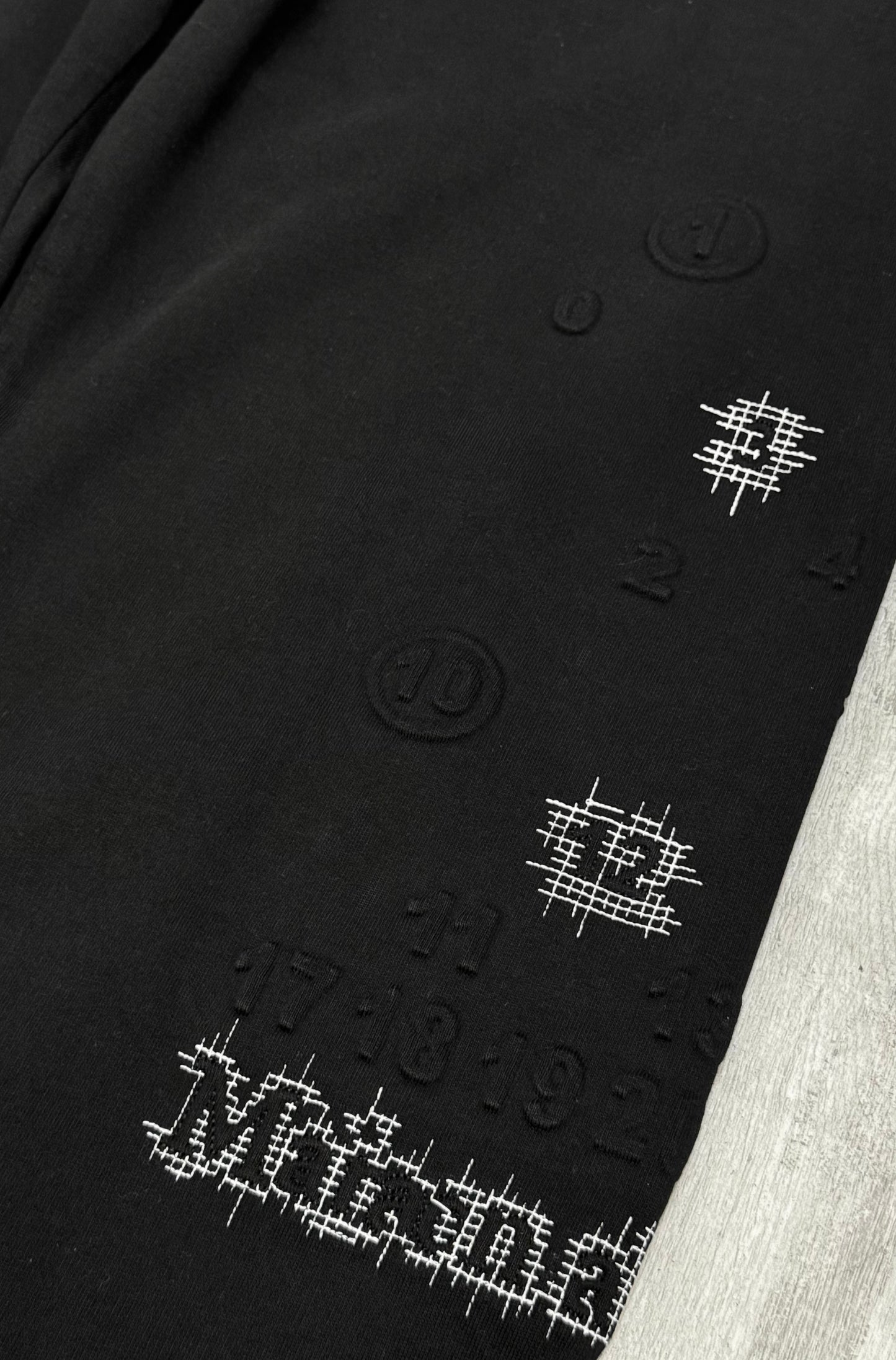 Wide leg printed sweatpants in black