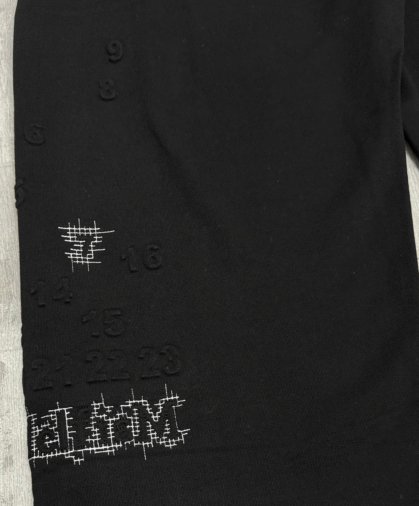 Wide leg printed sweatpants in black