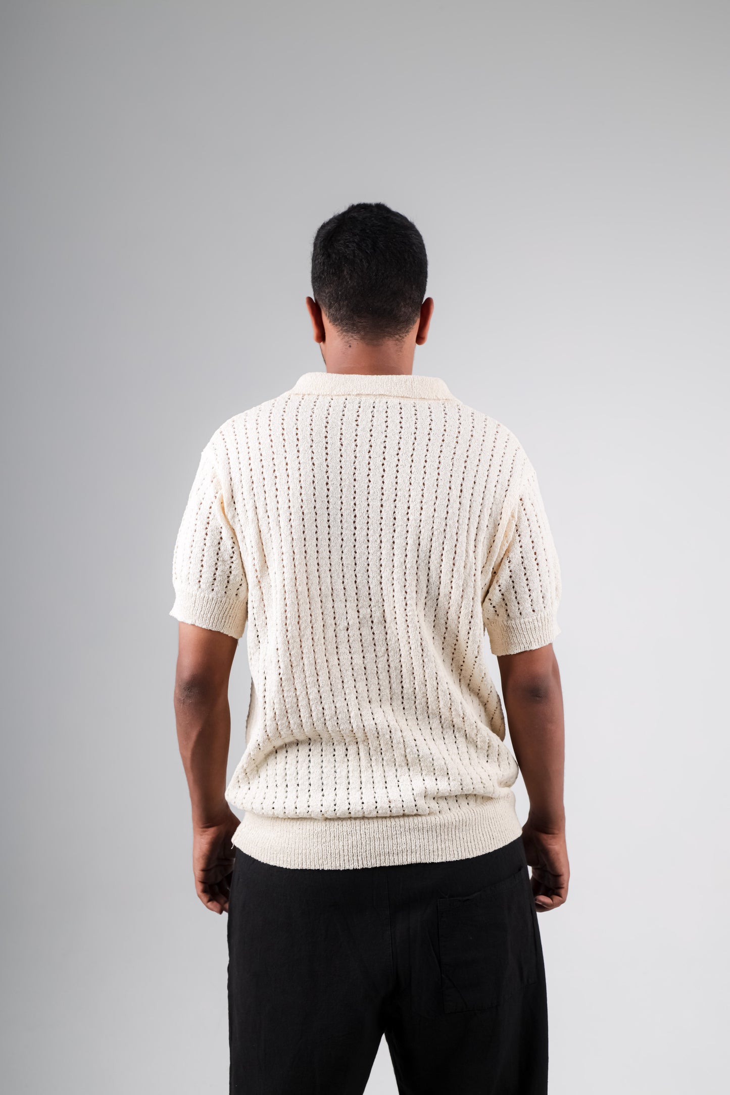Knitted polo shirt with palm printed