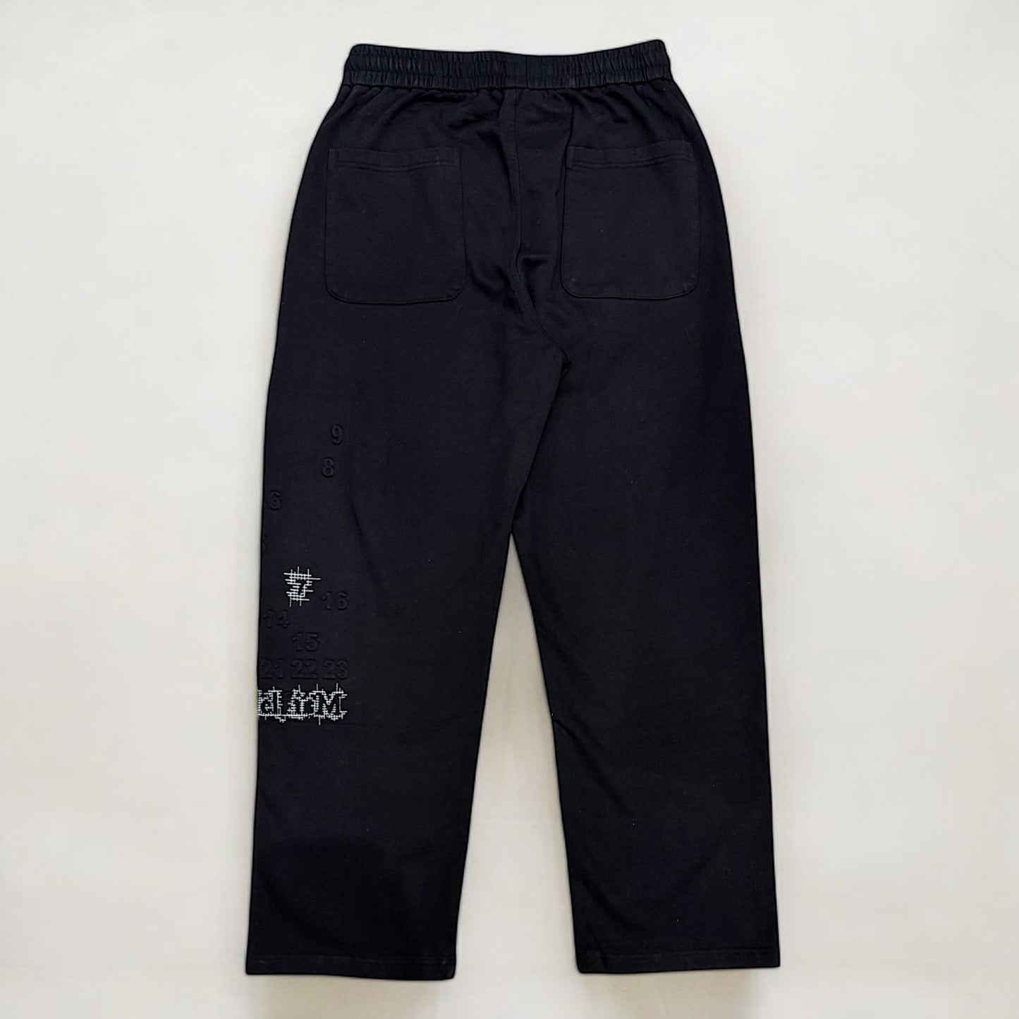 Wide leg printed sweatpants in black