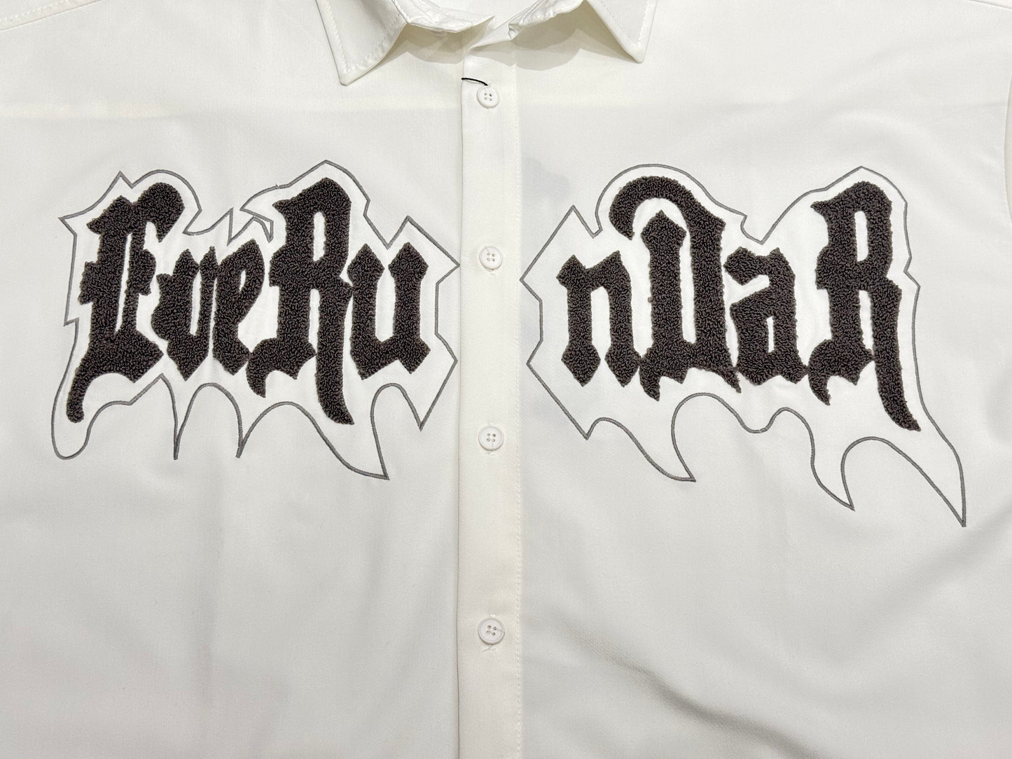 Oversized short sleeve shirt with front teddy stitching