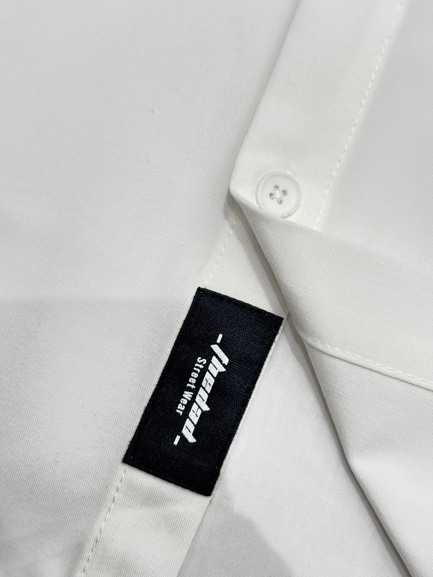 Oversized short sleeve shirt with front teddy stitching