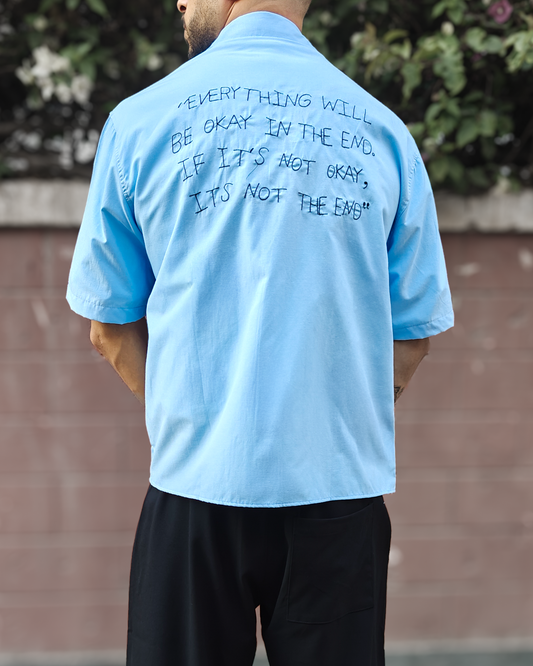 Short sleeve shirt with back stitching