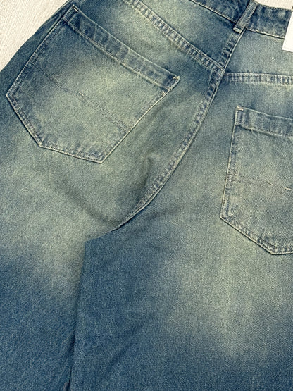 Balloon jeans in mid blue washed with yellow shades