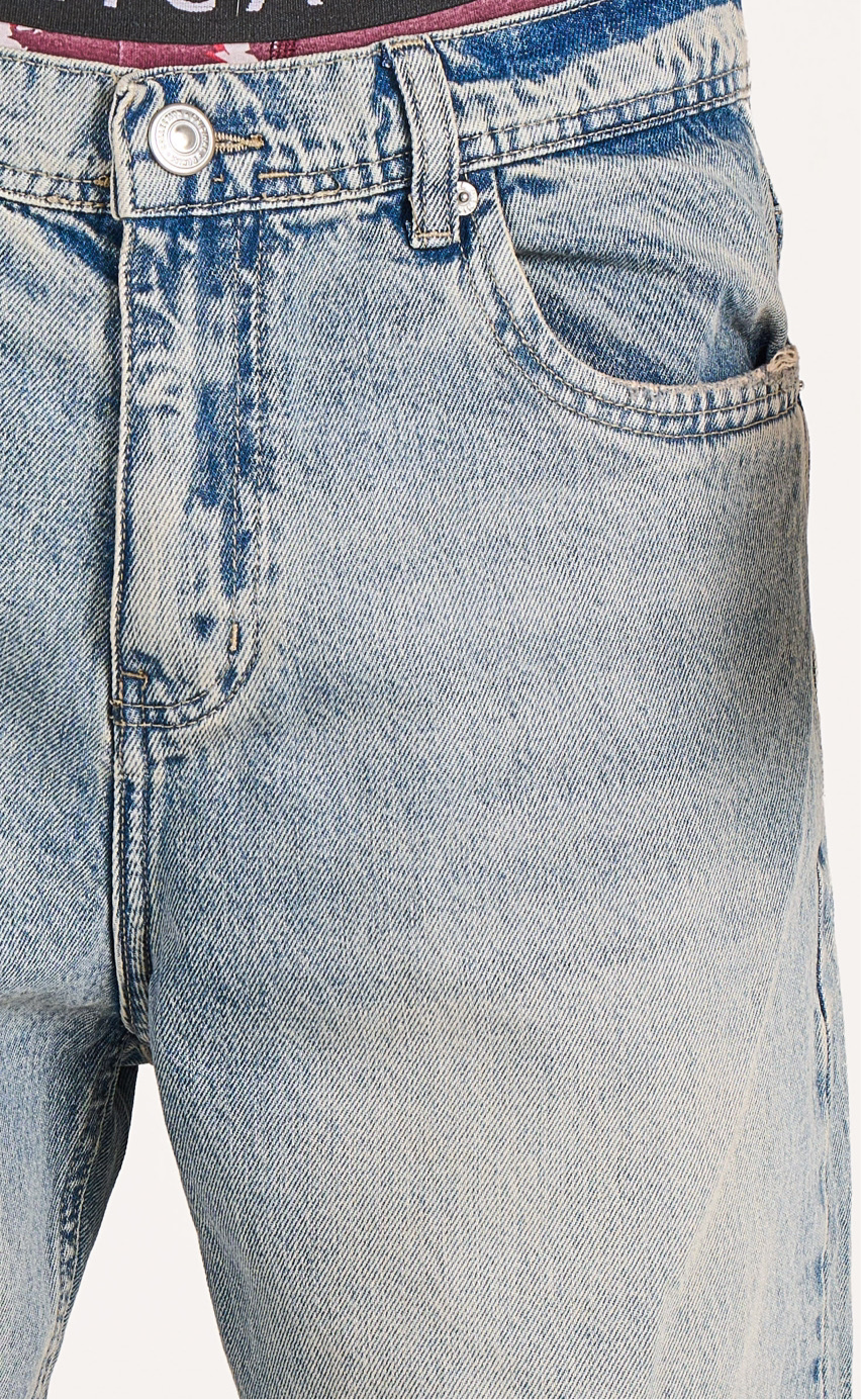 Baggy fit jeans in mid blue washed