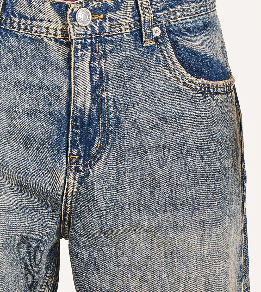 Baggy jeans in dark blue washed with yellow tint
