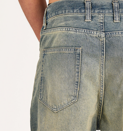 Baggy jeans in dark blue washed with green tint