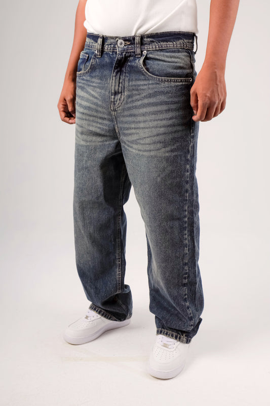 Baggy jeans in dark blue washed with yellow shades