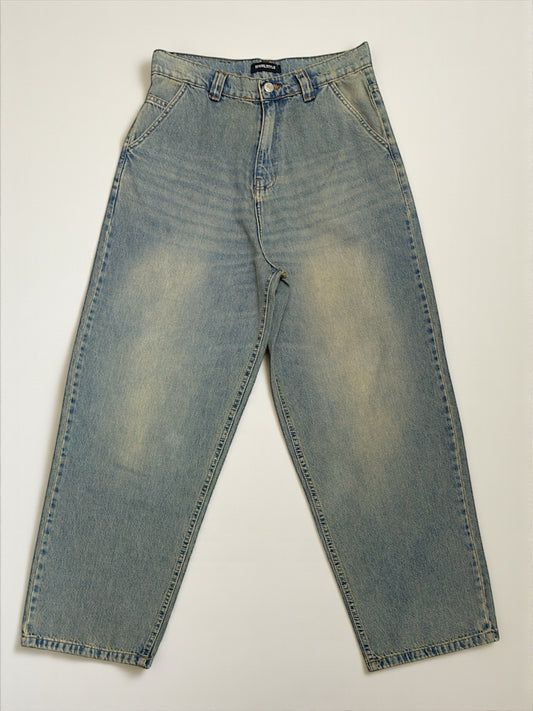 Ballon jeans in mid blue washed with yellow tint