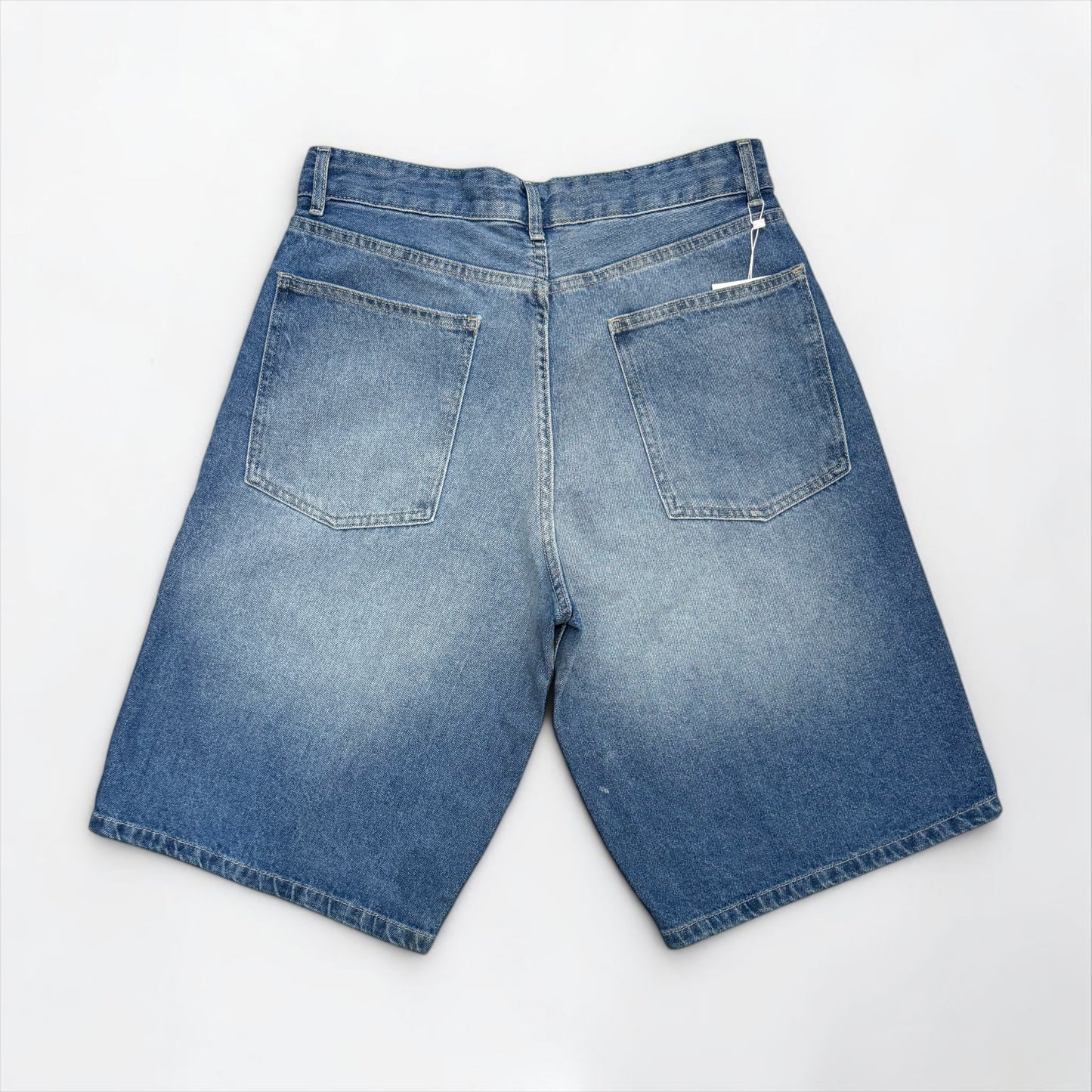 Baggy denim short in mid blue stone washed
