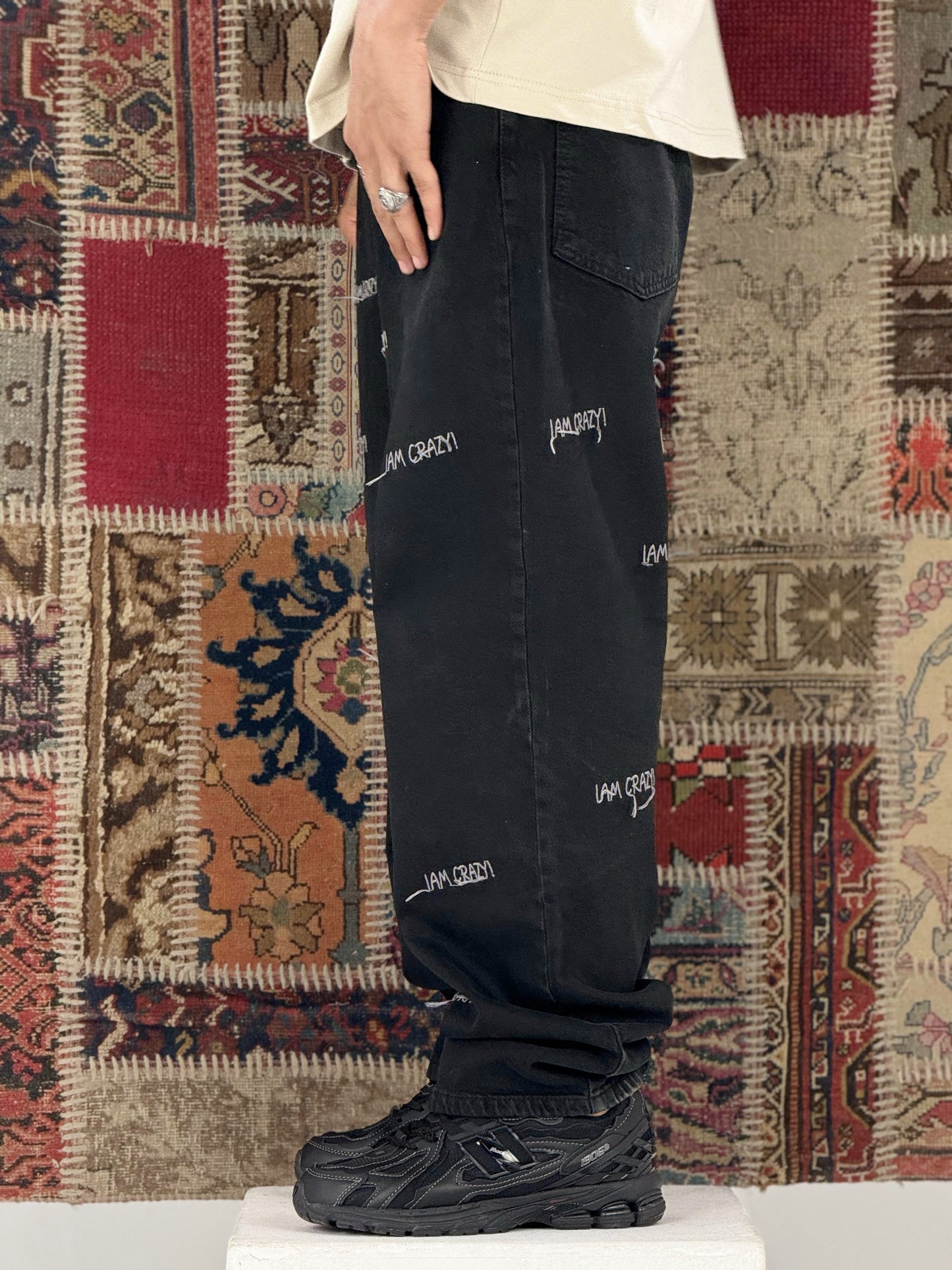 baggy fit Jeans with crazy stitches in black wash