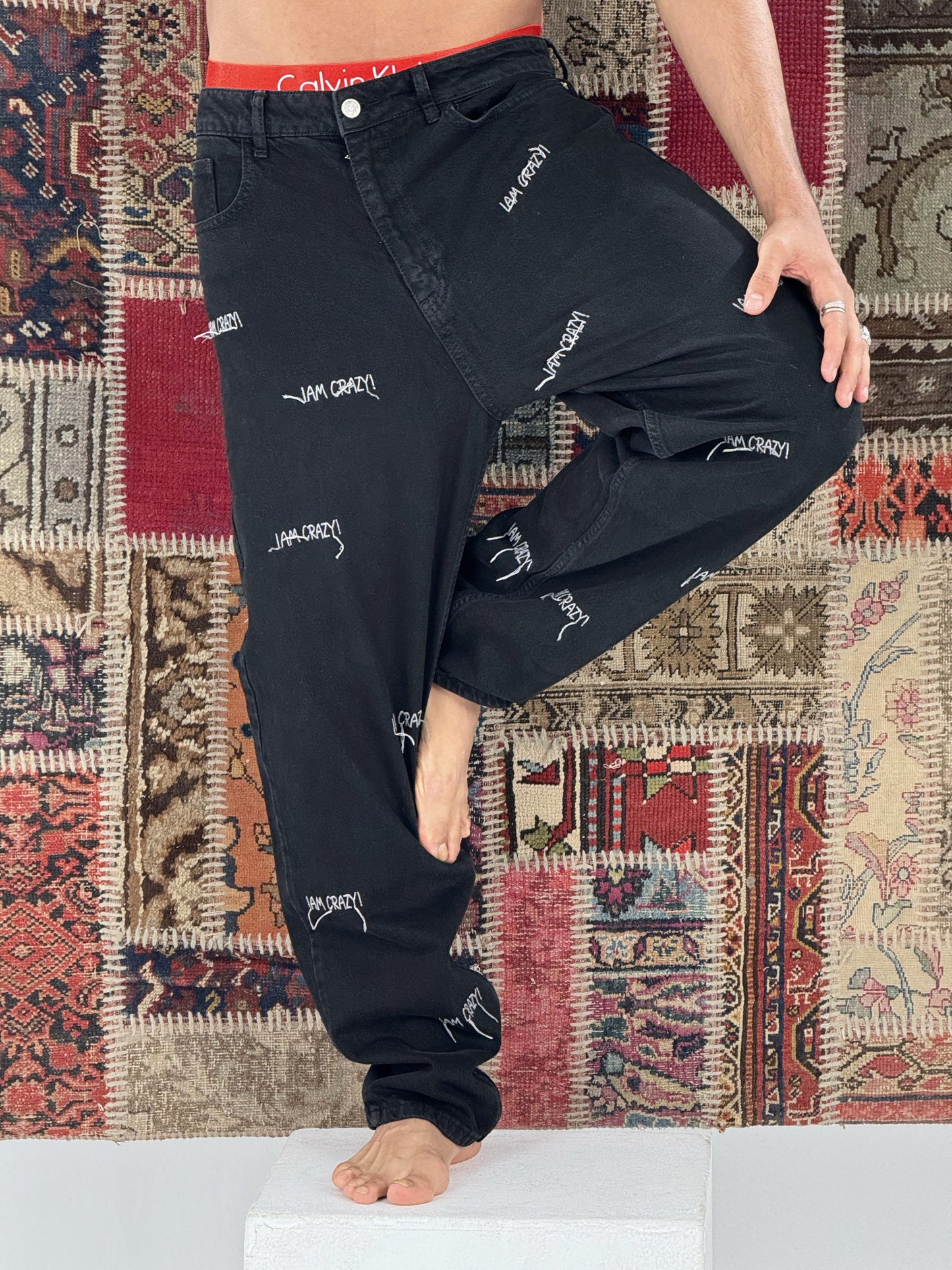 baggy fit Jeans with crazy stitches in black wash