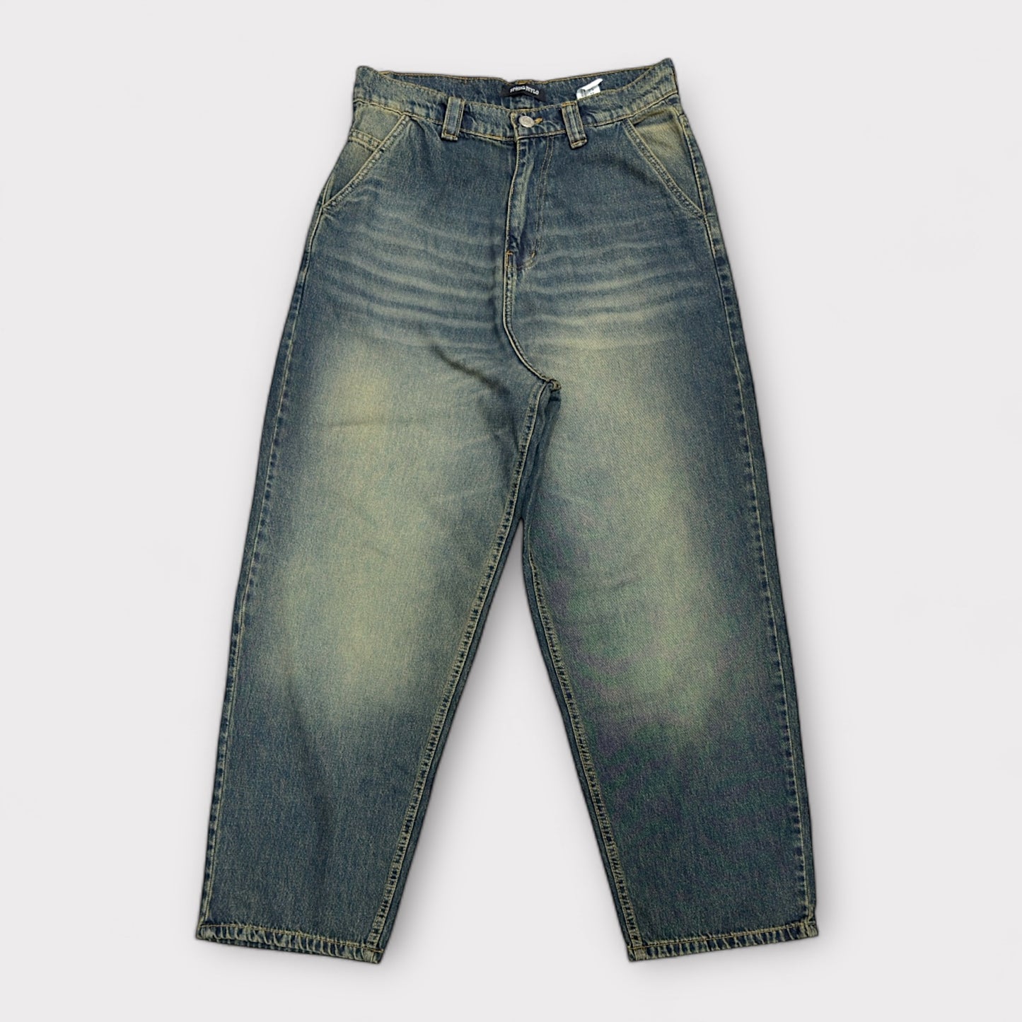 Ballon jeans in dark blue washed with olive tint