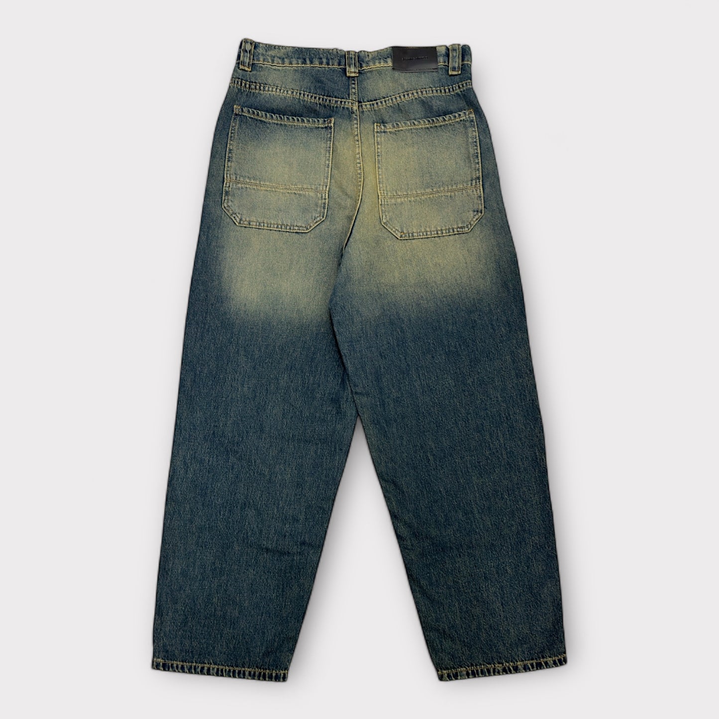 Ballon jeans in dark blue washed with olive tint