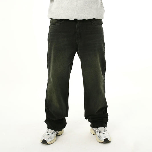 baggy fit jeans in black washed with yellow shades