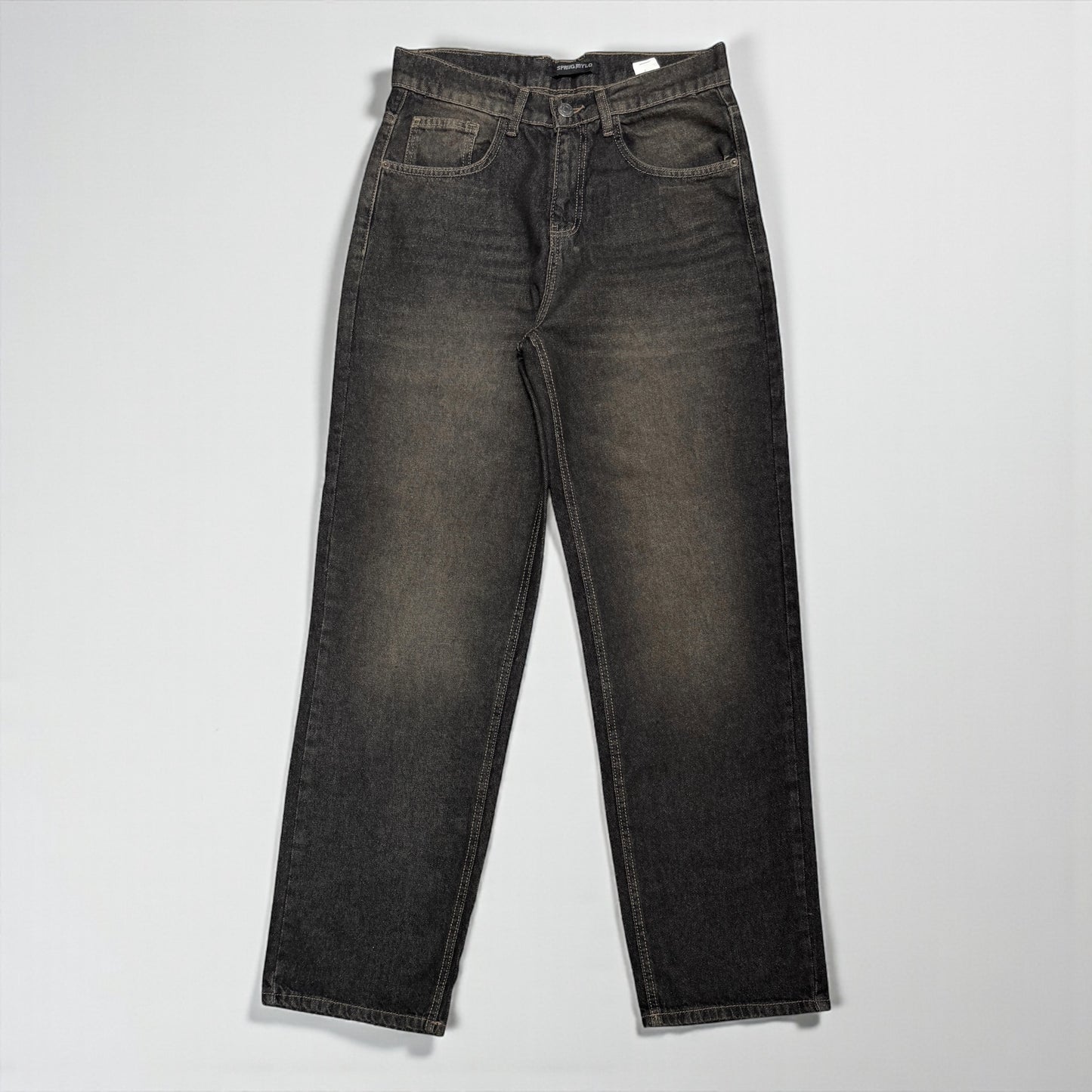 Baggy jeans in black wash with yellow shades