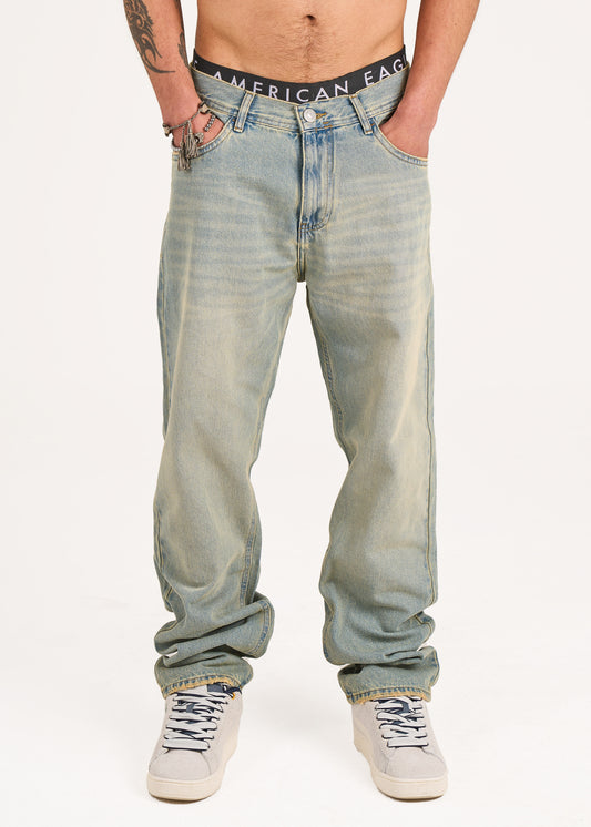 Baggy jeans in mid blue washed with yellow shades