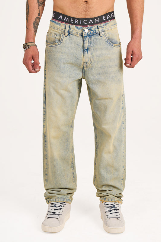 Baggy jeans in light blue with yellow stone wash